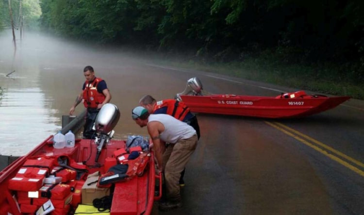 Coast Guard Marine Safety Unit Huntington Western River Flood Punt Team making preparations to get underway near Clendenin, West Virginia, June 24, 2016. The team is assisting in the flood response by responding to 911 calls, transporting locals to safety, delivering water and clearing roadways of fallen trees. U.S. Coast Guard photo
