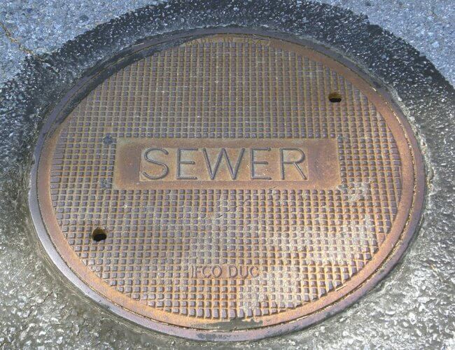A metal sewer cover