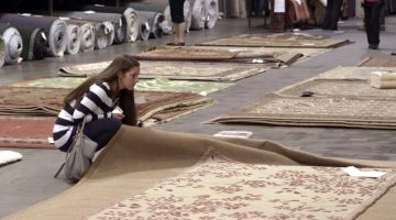 A customer shops at Rusmur Floors Carpet One during the company's warehouse sale.