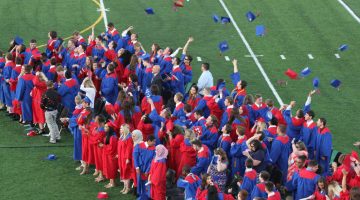 Chartiers Valley Class of 2017 graduates toss their caps in their air at their commencement ceremony.